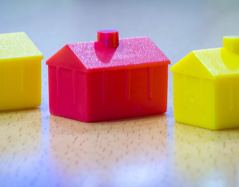 Das Bild zeigt 3 Miniaturhäuser als Imagebild
