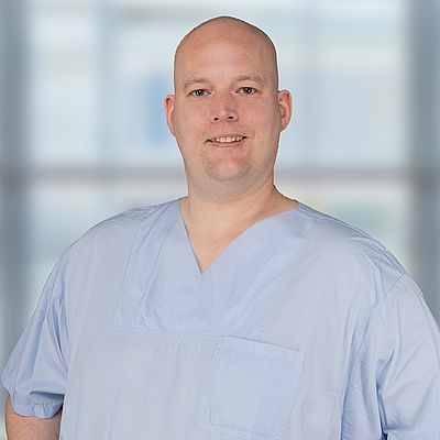 Das Bild zeigt ein Porträt von Andreas Brand 