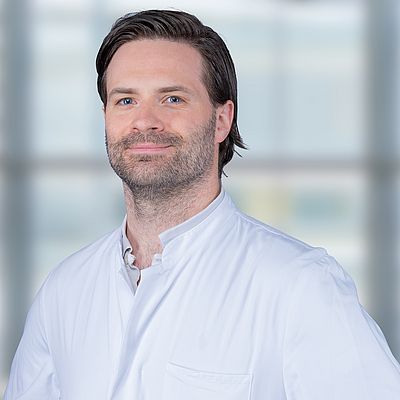 Das Bild zeigt ein Portrait von Felix Rühlmann
