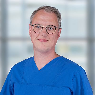 Das Bild zeigt ein Porträt von Fabian Müller